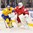 BUFFALO, NEW YORK - DECEMBER 26: Sweden's Tim Soderlund #9 makes contact with Belarus goalie Andrei Grishenko #20 during the preliminary round of the 2018 IIHF World Junior Championship. (Photo by Andrea Cardin/HHOF-IIHF Images)

